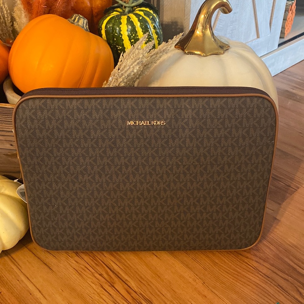 Brand new with tags Michael Kors laptop case in brown!